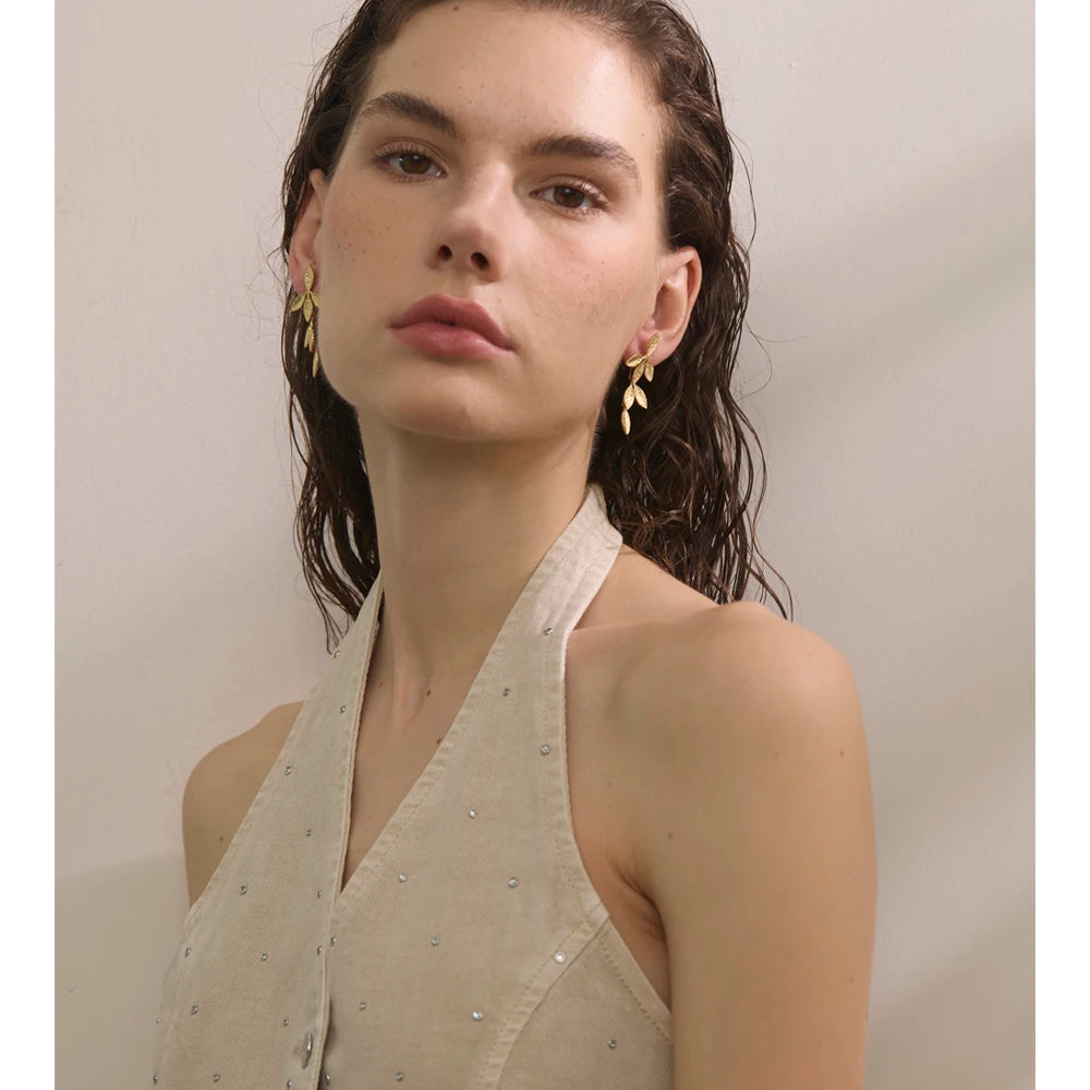 Geometric earrings in gold-plated stainless steel.