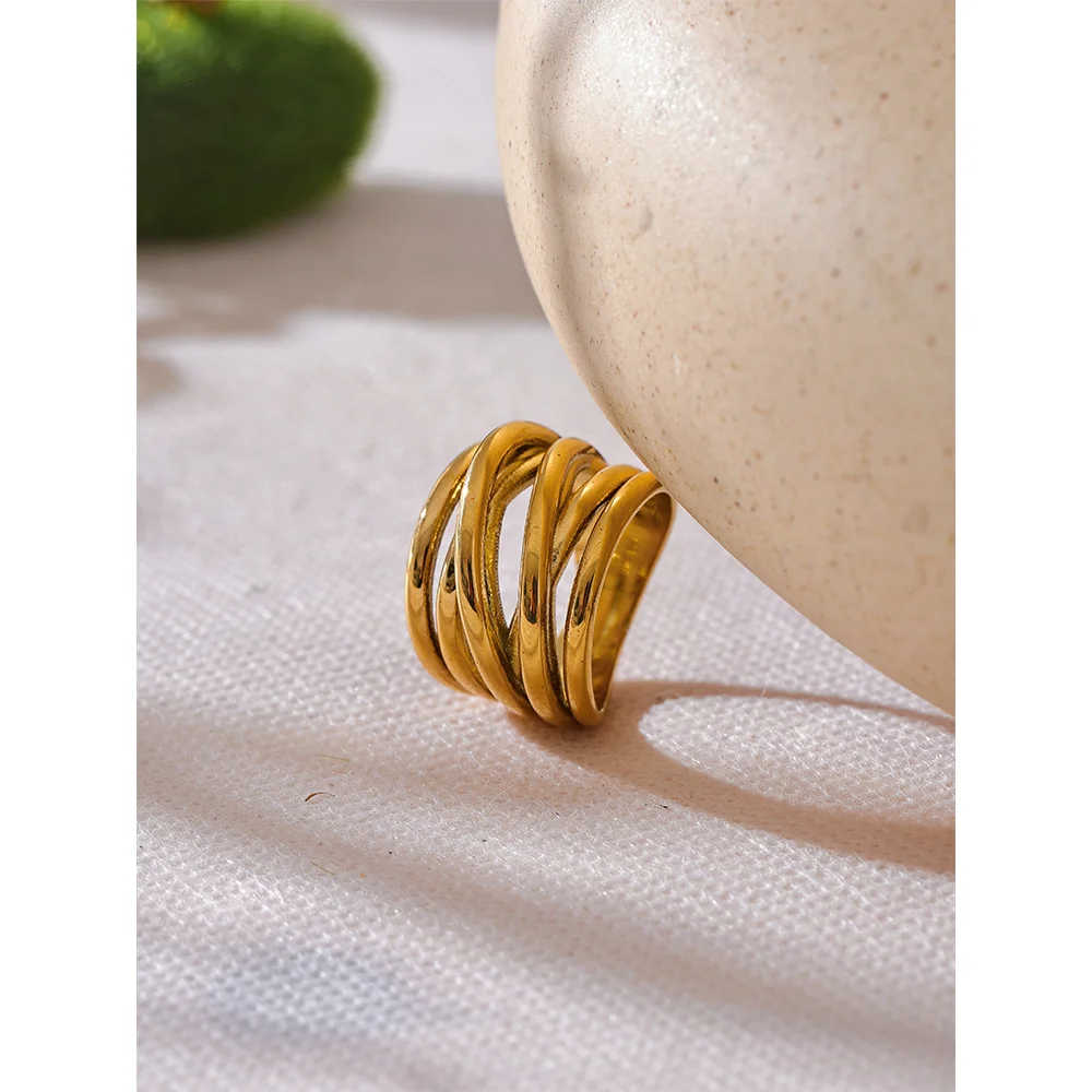 Geometric ring in 18K gold-plated stainless steel.