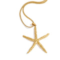 Star geometric necklace in gold-plated stainless steel.