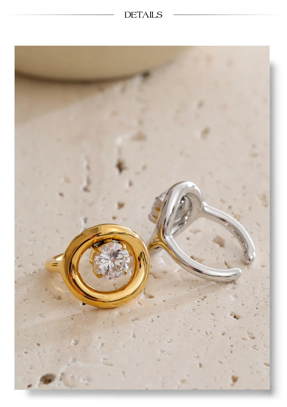 Cubic zirconia geometric ring in 18K gold-plated stainless steel with cubic zirconia.