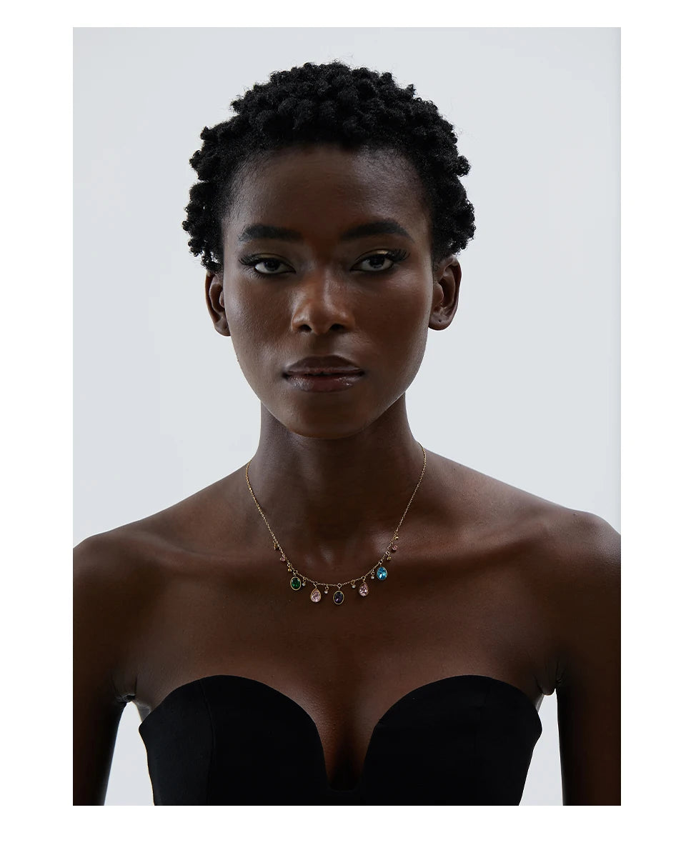 Cubic zirconia multi-color geometric necklace in gold-plated stainless steel with cubic zirconia.