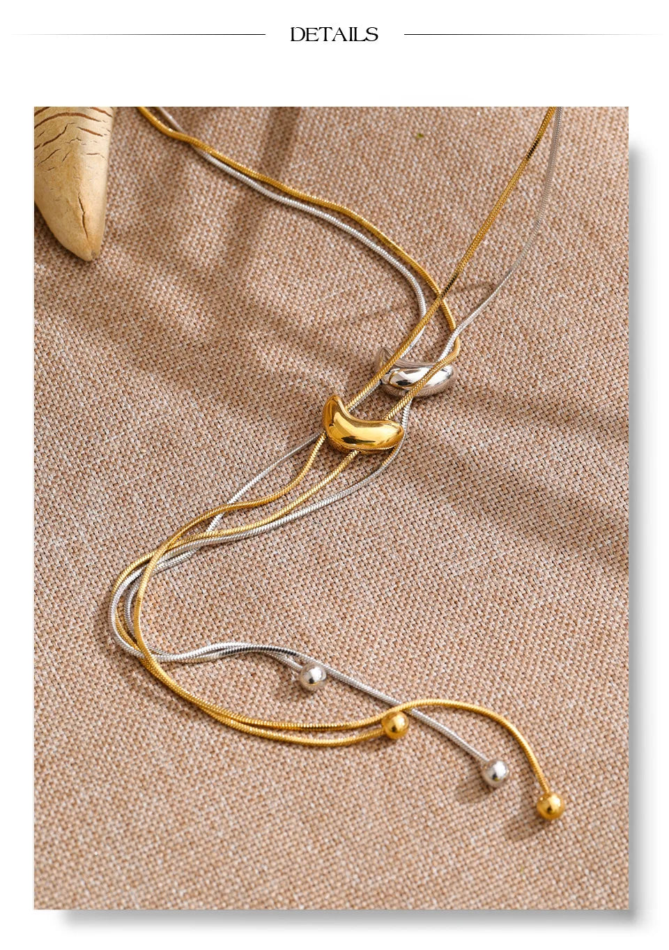 Geometric chain necklace in gold-plated stainless steel.
