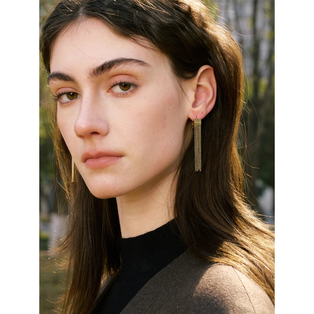 Geometric chain earrings in gold-plated stainless steel.