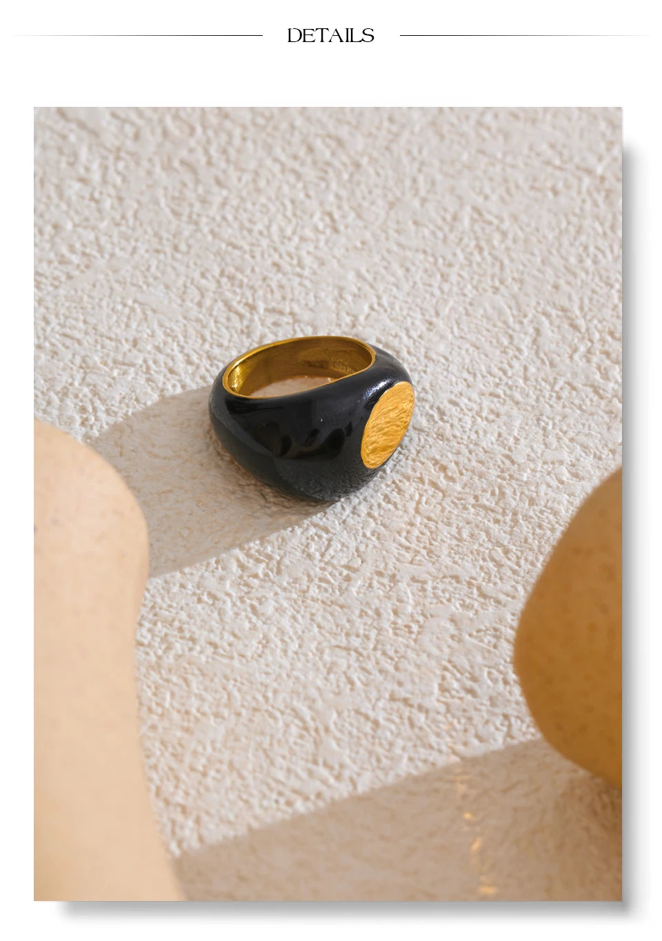 Black enamel geometric ring in gold-plated 316L stainless steel with enamel.