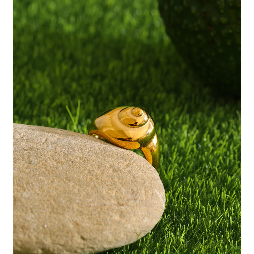 Geometric ring in 18K gold-plated stainless steel.