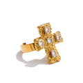 Cubic zirconia cross multi-color ring in 18K gold-plated stainless steel with cubic zirconia.