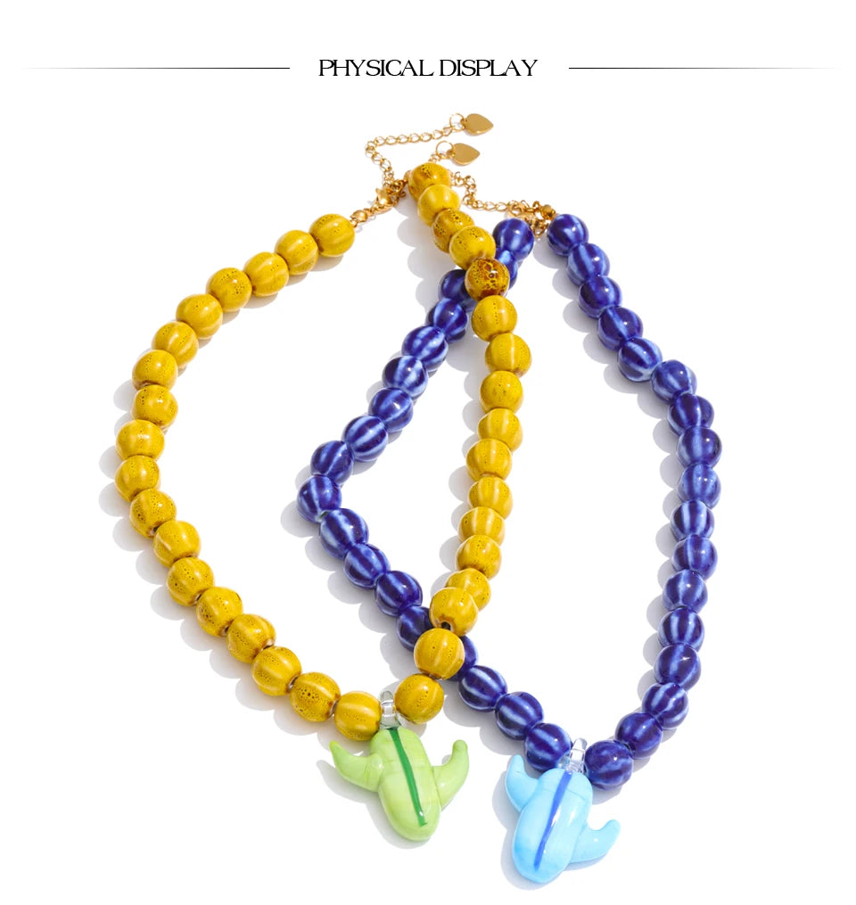 Blue beaded geometric necklace in gold-plated stainless steel.