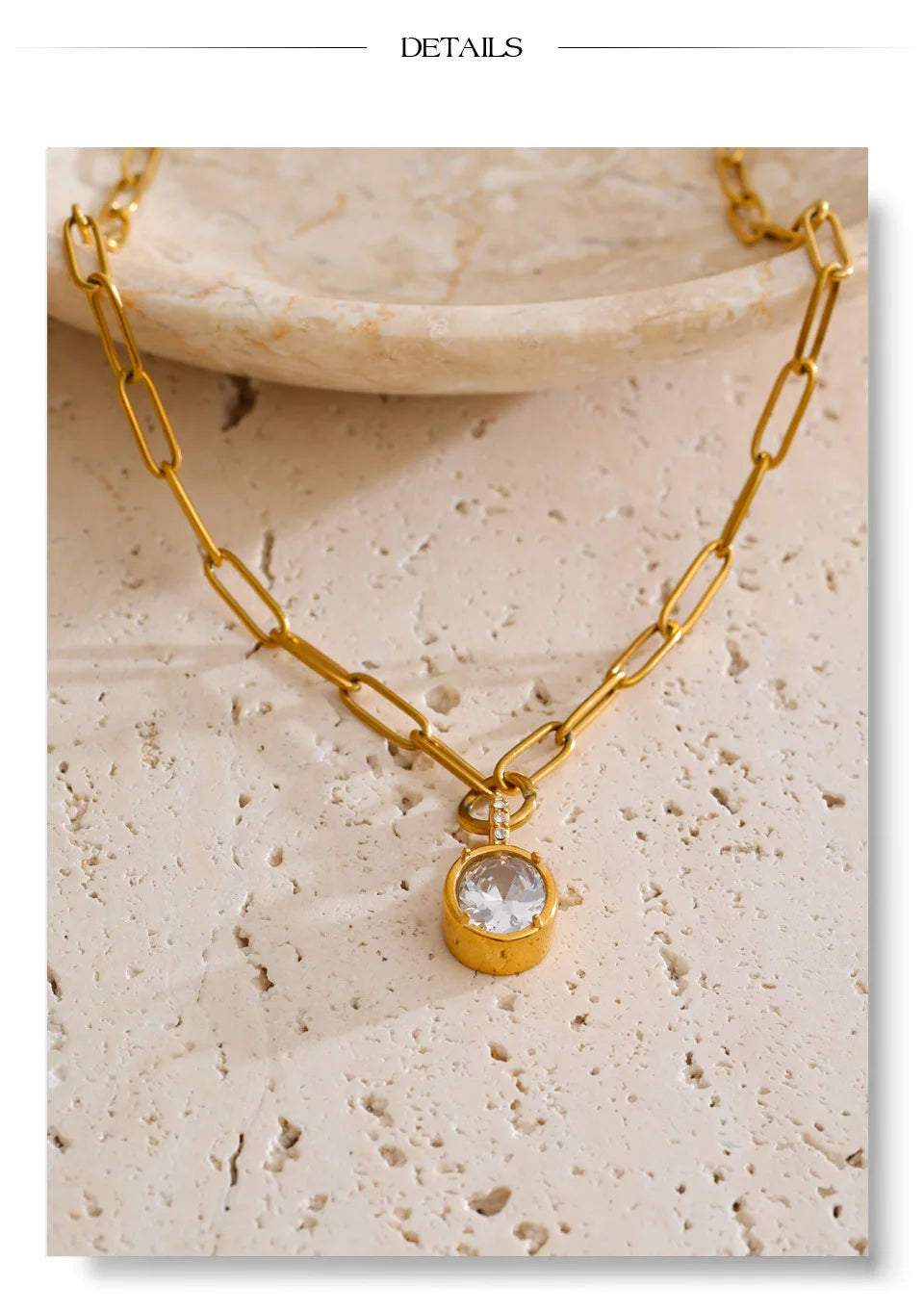 Cubic zirconia geometric necklace in gold-plated stainless steel with cubic zirconia.