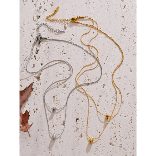 Chain layered necklace in gold-plated stainless steel.