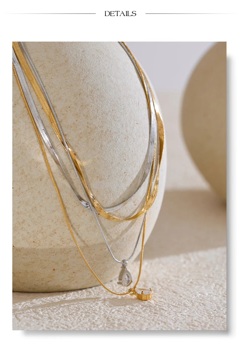Cubic zirconia snake geometric necklace in gold-plated stainless steel with cubic zirconia.