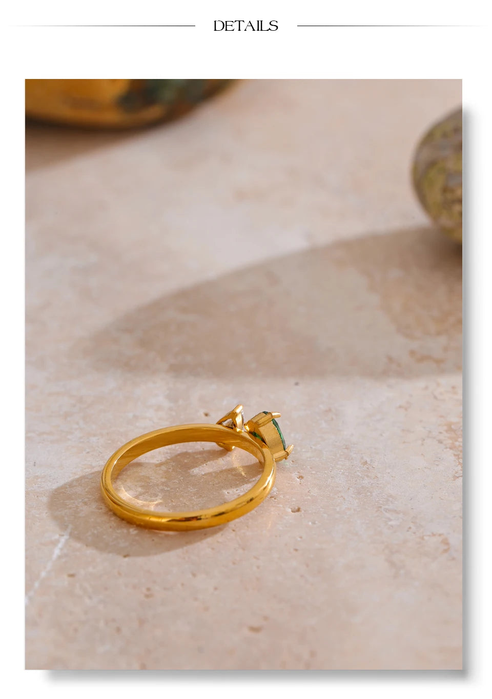 Cubic zirconia geometric ring in 18K gold-plated stainless steel with cubic zirconia.