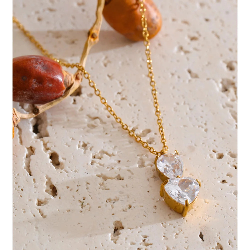 Cubic zirconia geometric necklace in gold-plated stainless steel with cubic zirconia.