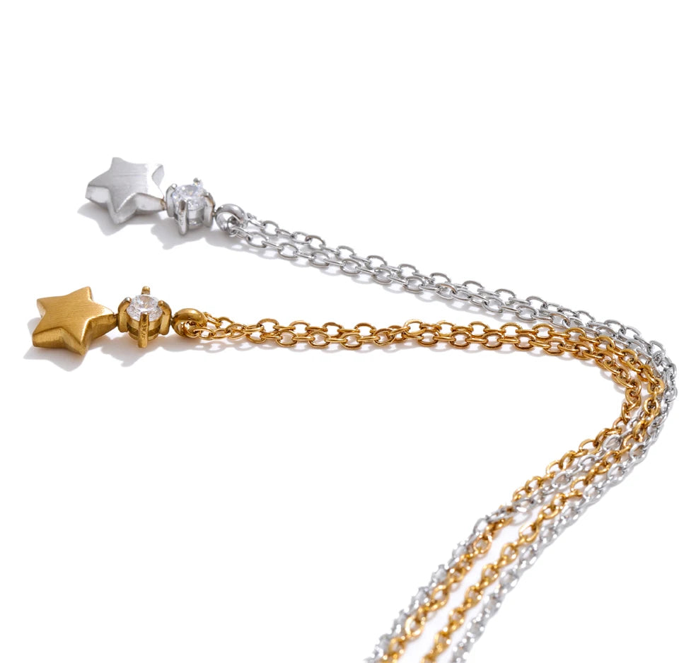 Cubic zirconia star necklace in gold-plated stainless steel with cubic zirconia.