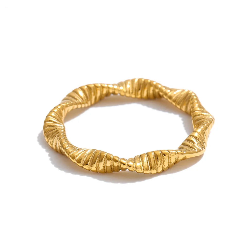 Geometric ring in 18K gold-plated stainless steel.
