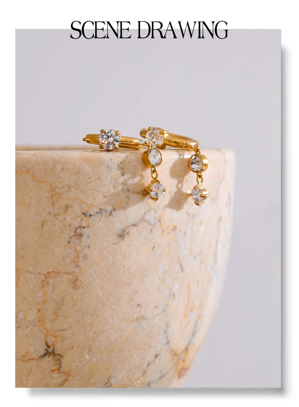 Cubic zirconia geometric earrings in gold-plated stainless steel with cubic zirconia.
