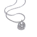 Hammered minimalist geometric necklace in gold-plated stainless steel.