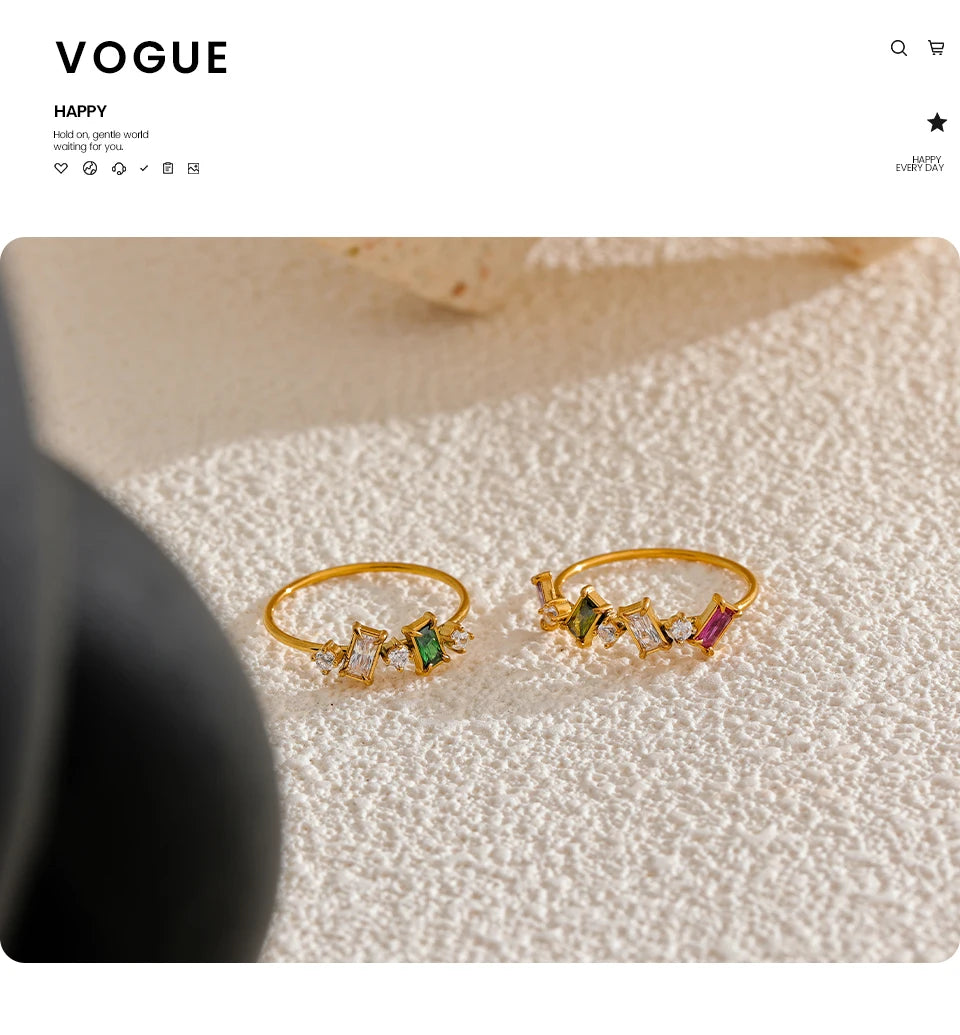 Cubic zirconia multi-color geometric ring in 18K gold-plated stainless steel with cubic zirconia.
