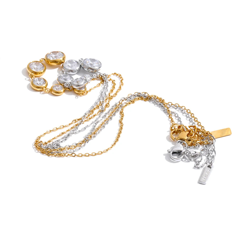 Cubic zirconia geometric chain necklace in gold-plated stainless steel with cubic zirconia.