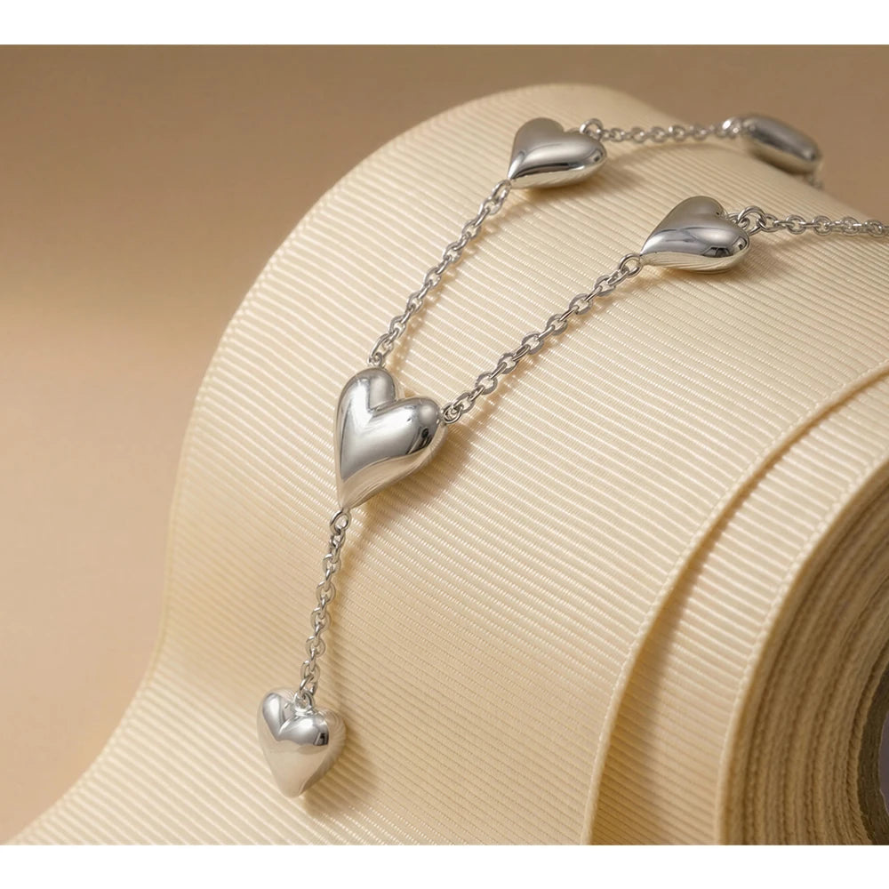 Heart chain necklace in gold-plated stainless steel.