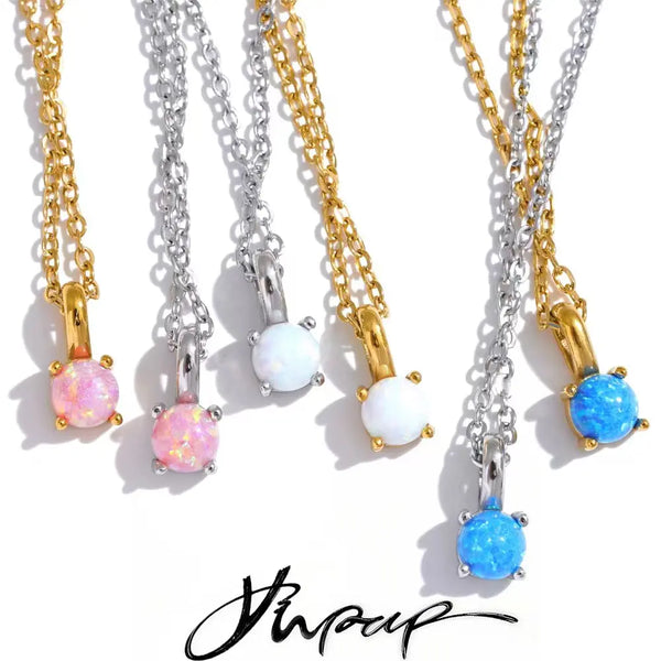 Gold-plated stainless steel necklace with natural stone pendants in shades of blue, pink, and white.