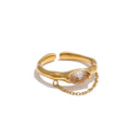 Cubic zirconia geometric chain ring in 18K gold-plated stainless steel with cubic zirconia.