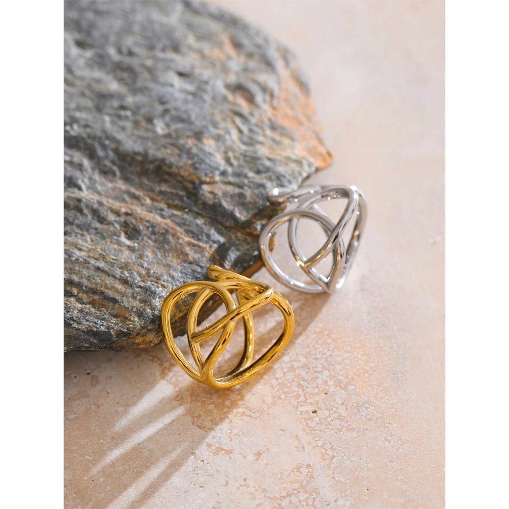 Geometric ring in gold-plated stainless steel.