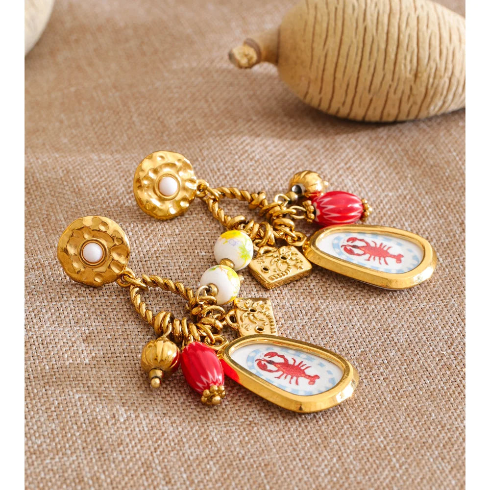 Geometric earrings in gold-plated stainless steel.