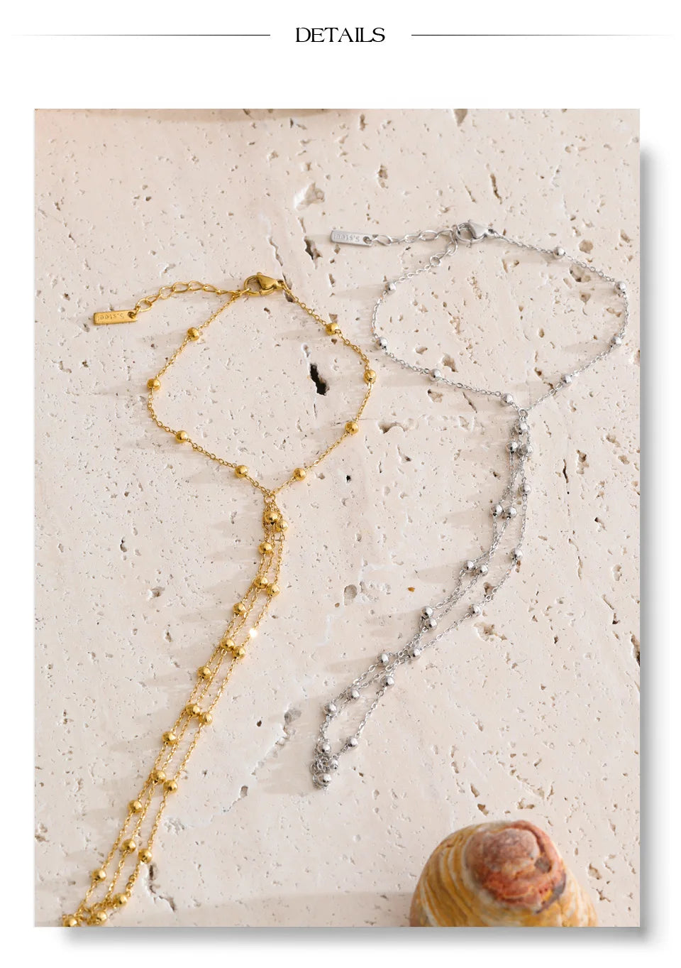 Beaded geometric chain necklace in gold-plated stainless steel.