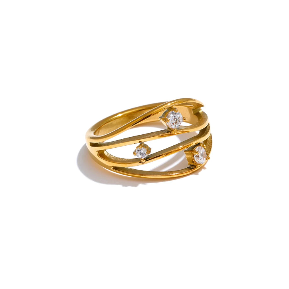 Cubic zirconia geometric ring in 18K gold-plated stainless steel with cubic zirconia.