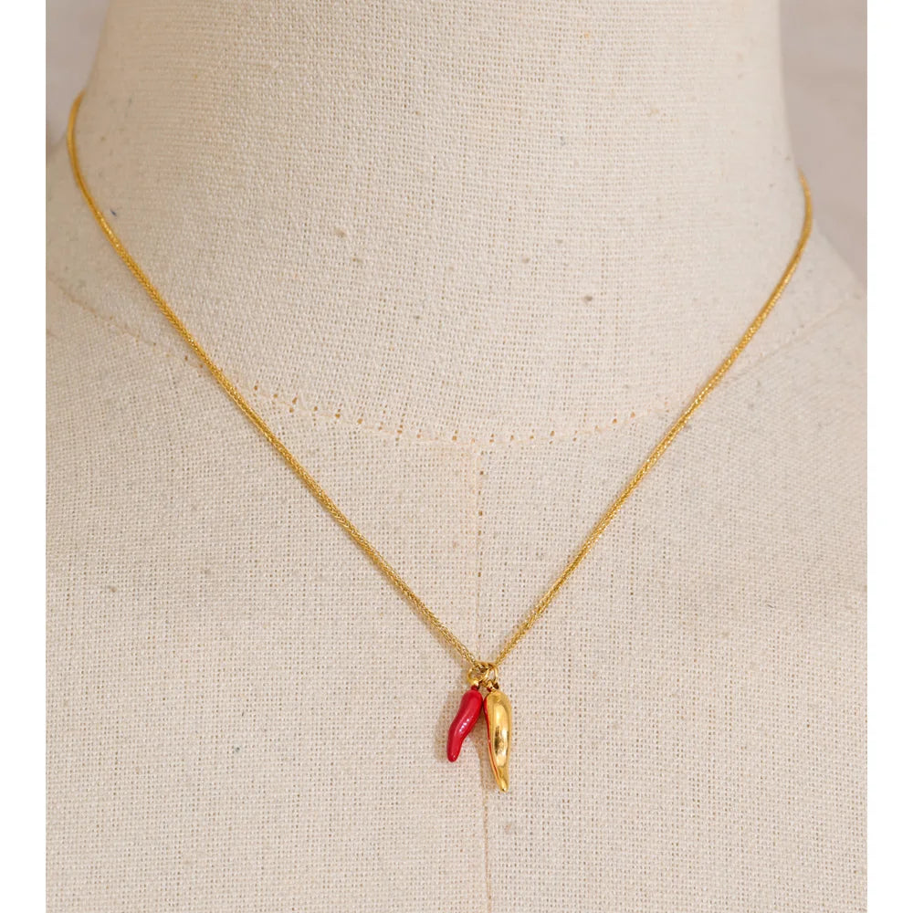 Red enamel geometric necklace in gold-plated stainless steel with enamel.
