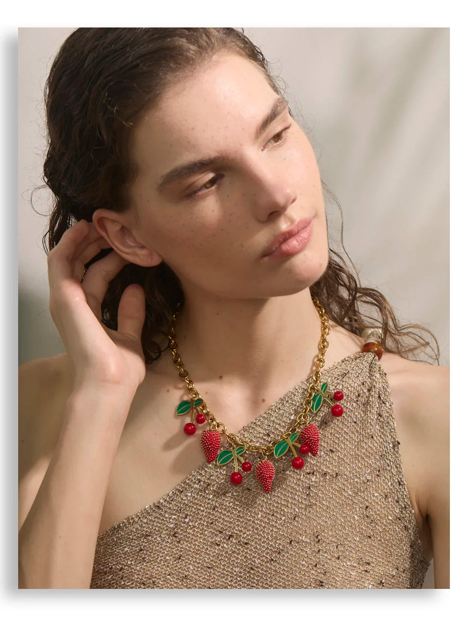 Red acrylic enamel necklace in gold-plated stainless steel with acrylic and enamel.