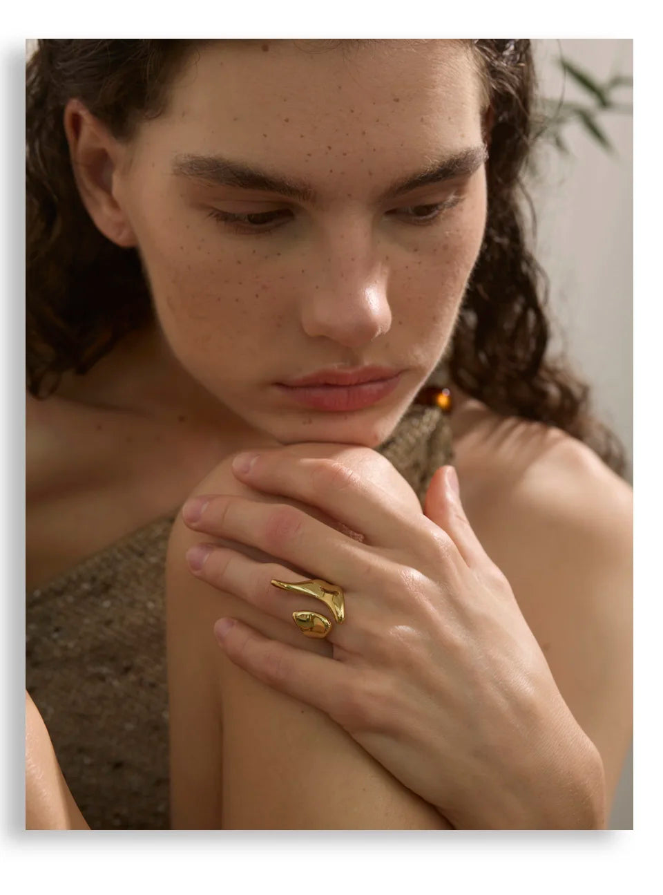 Geometric ring in 18K gold-plated stainless steel.