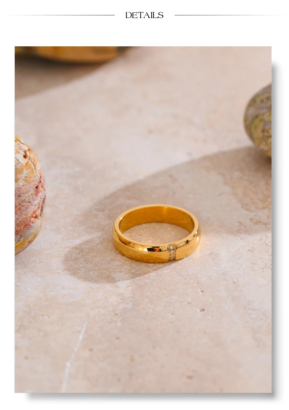Cubic zirconia geometric ring in 18K gold-plated stainless steel with cubic zirconia.