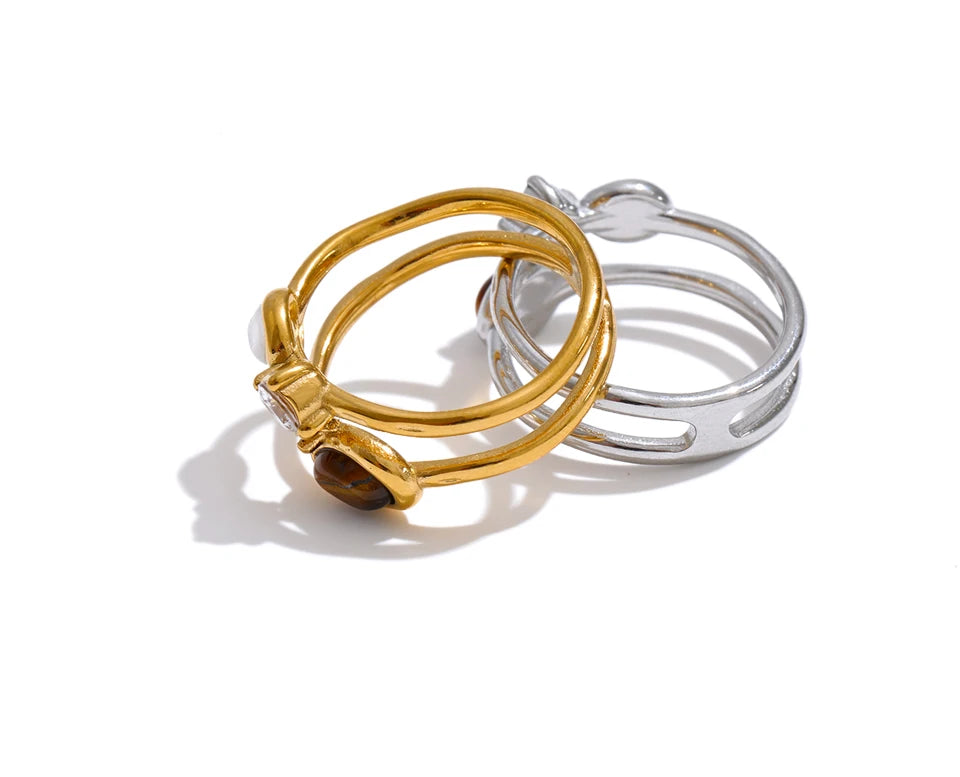 Cubic zirconia natural stone geometric ring in 18K gold-plated stainless steel with cubic zirconia and natural stone.
