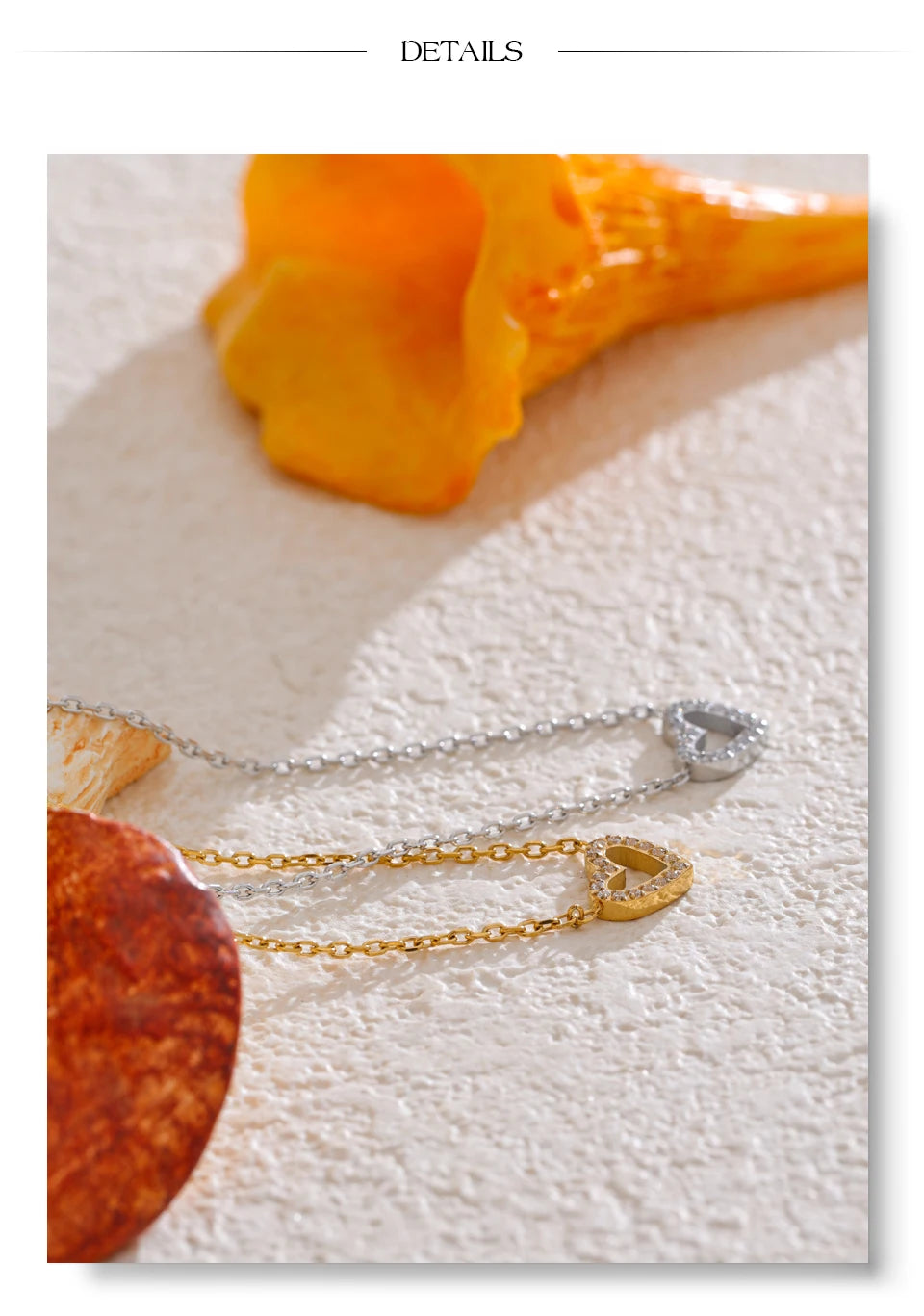 Cubic zirconia heart necklace in gold-plated stainless steel with cubic zirconia.