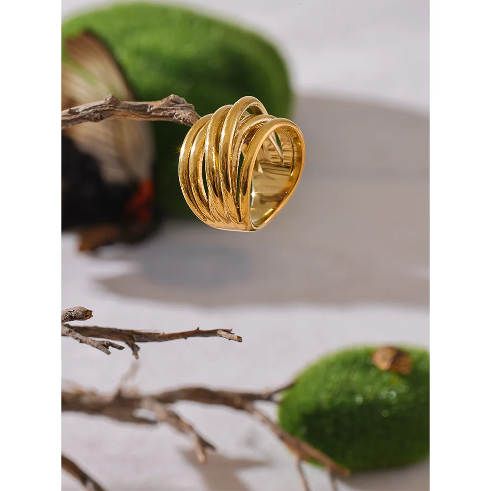 Geometric ring in 18K gold-plated stainless steel.