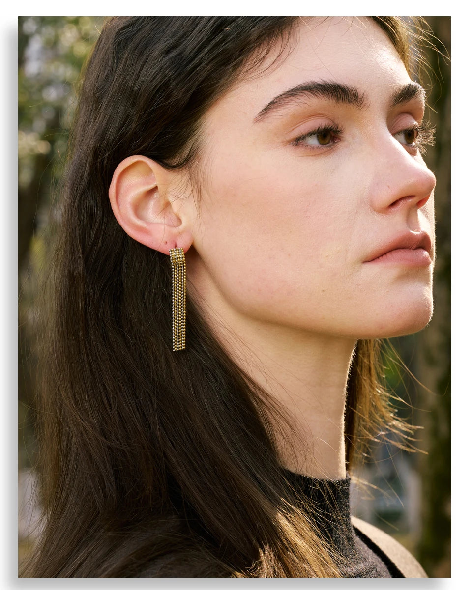 Geometric chain earrings in gold-plated stainless steel.