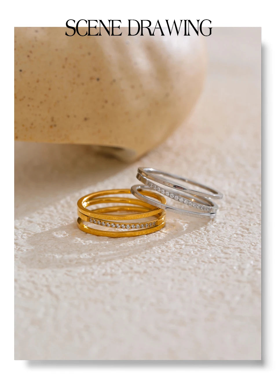 Cubic zirconia geometric ring in gold-plated stainless steel with cubic zirconia.