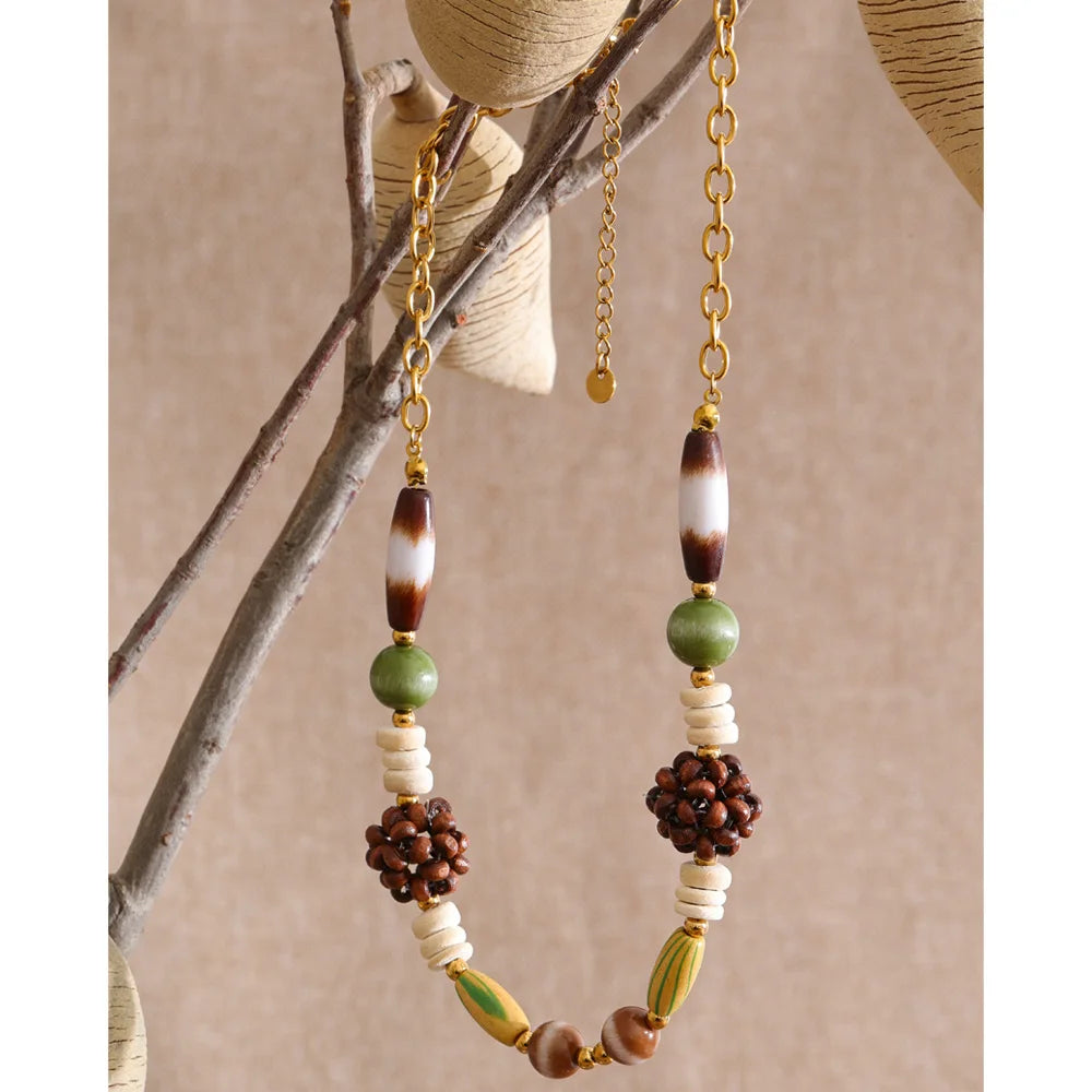 Beaded geometric chain necklace in gold-plated stainless steel.