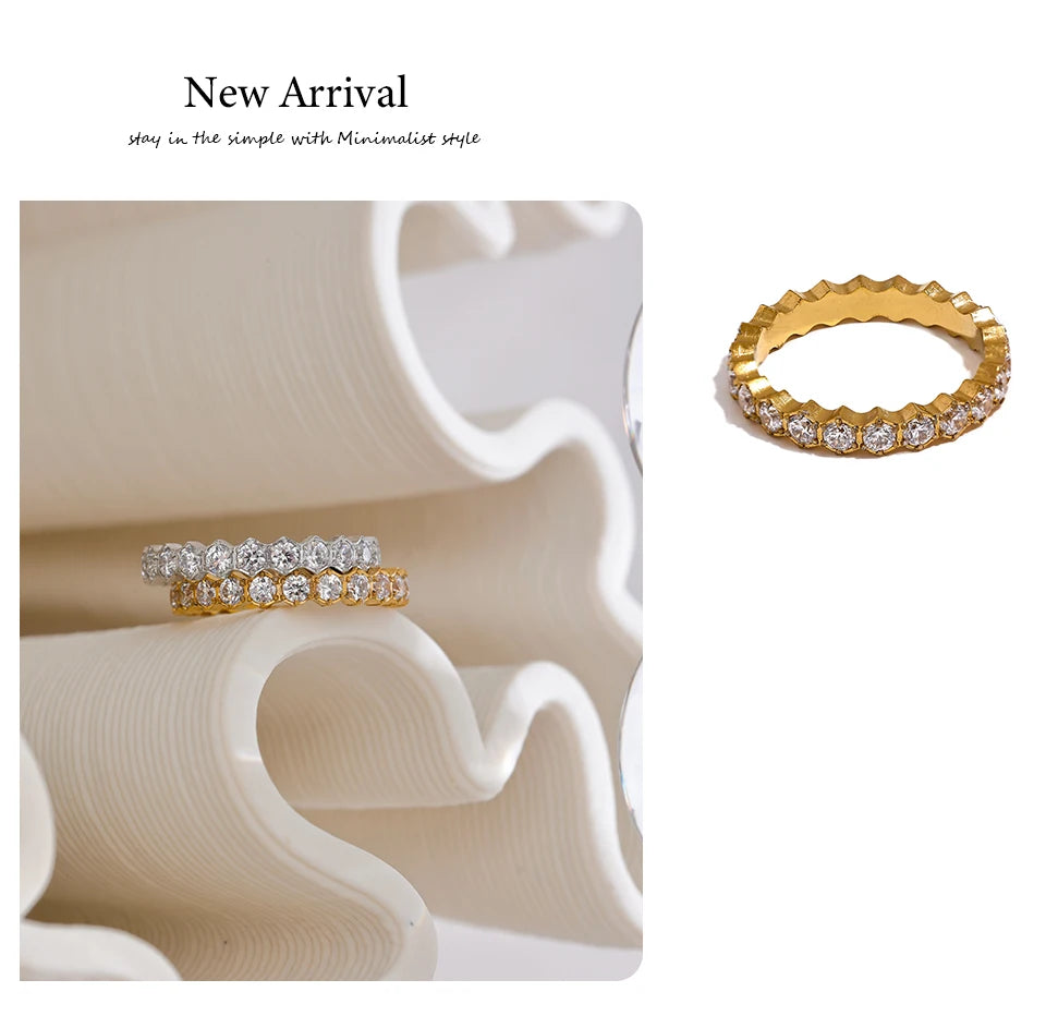 White cubic zirconia geometric ring in gold-plated stainless steel with cubic zirconia.