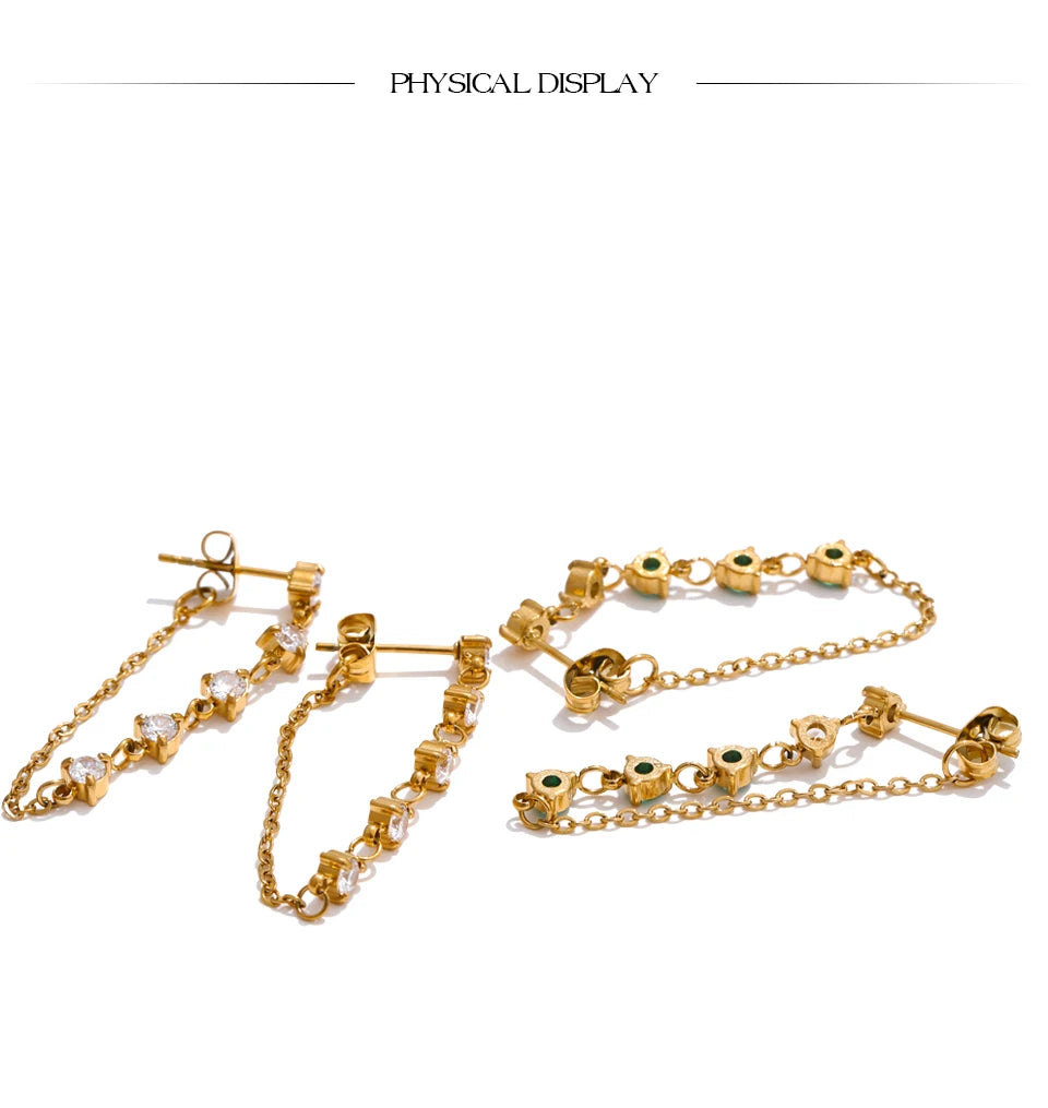 White cubic zirconia geometric earrings in gold-plated stainless steel with cubic zirconia.