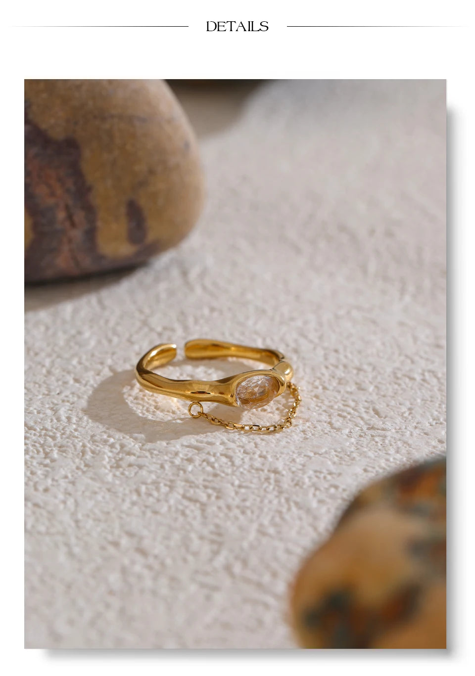 Cubic zirconia geometric chain ring in 18K gold-plated stainless steel with cubic zirconia.