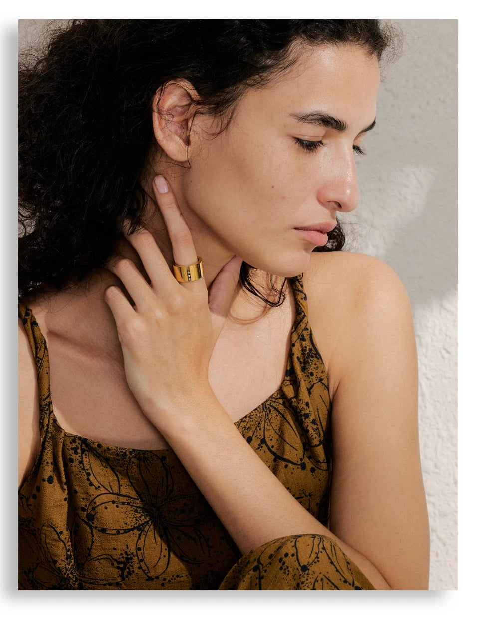 Geometric ring in gold-plated stainless steel.
