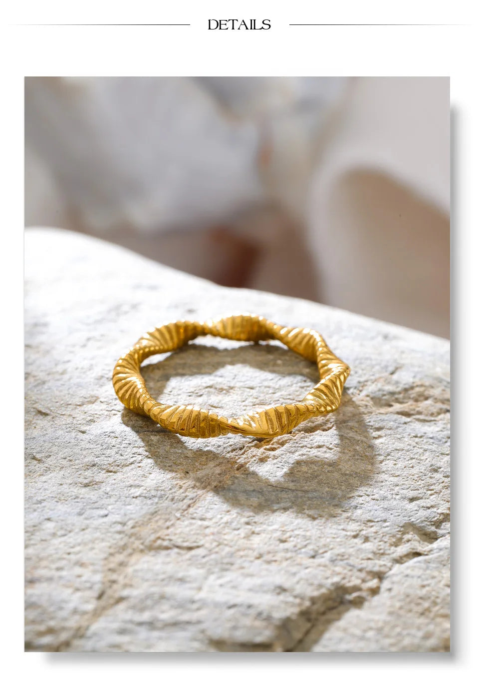 Geometric ring in 18K gold-plated stainless steel.