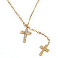 Cubic zirconia cross chain necklace in gold-plated stainless steel with cubic zirconia.
