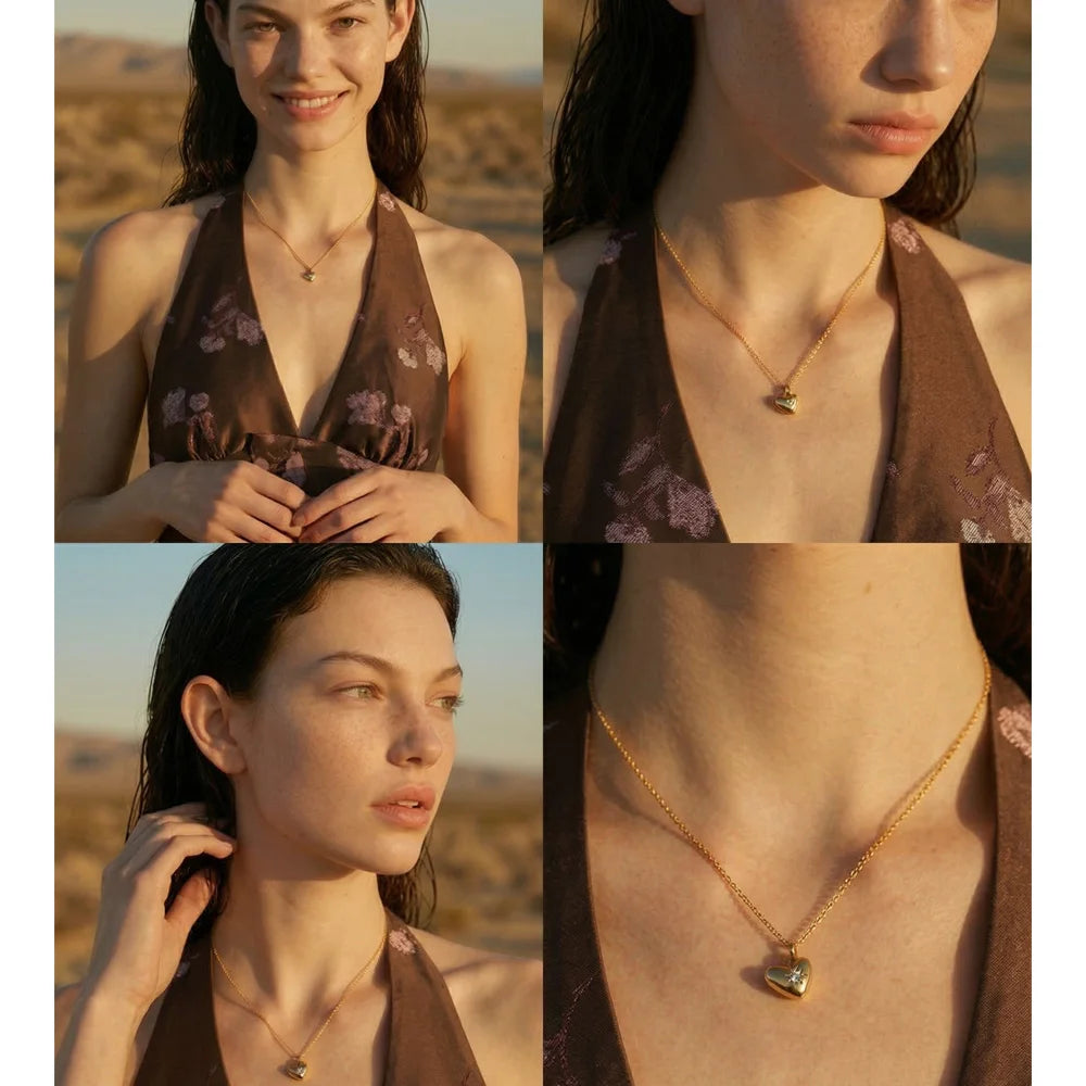 Cubic zirconia heart necklace in gold-plated stainless steel with cubic zirconia.
