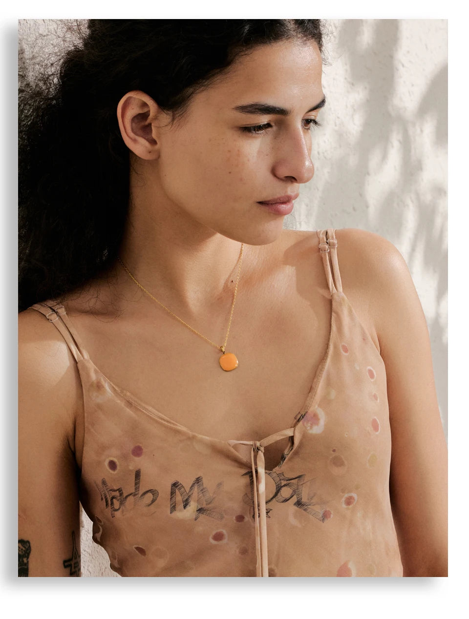 Geometric necklace in gold-plated stainless steel.