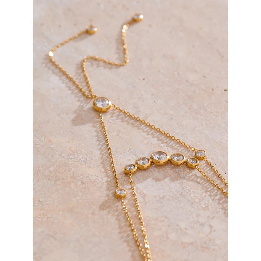 Cubic zirconia geometric chain necklace in gold-plated stainless steel with cubic zirconia.