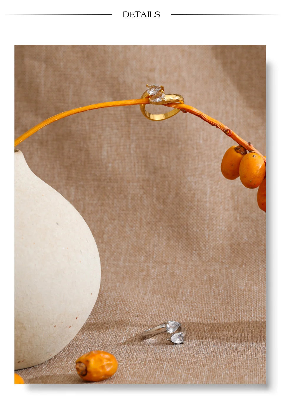 Cubic zirconia geometric ring in 18K gold-plated stainless steel with cubic zirconia.