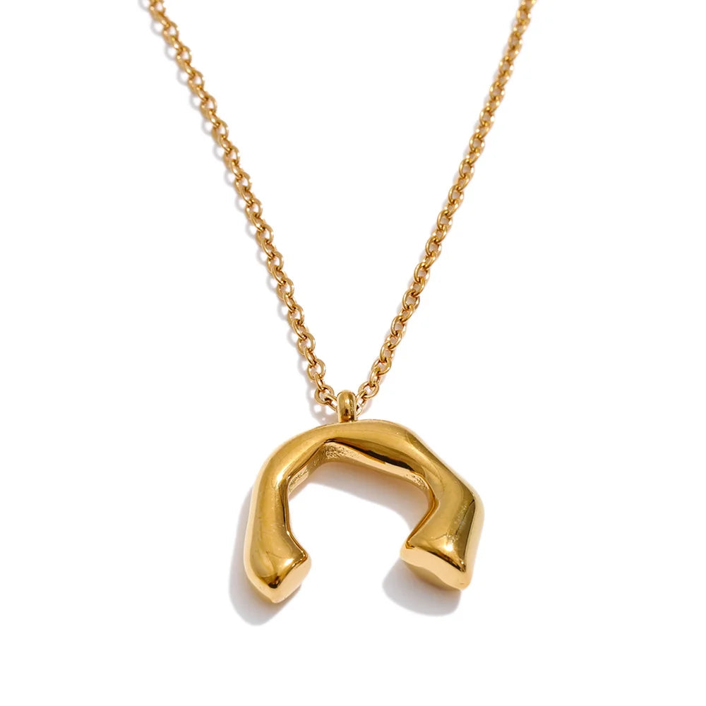 Minimalist geometric necklace in gold-plated stainless steel.